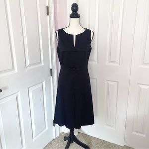 Donna Ricco NY black plunge neckline, 2 front bows, interior polka dots,